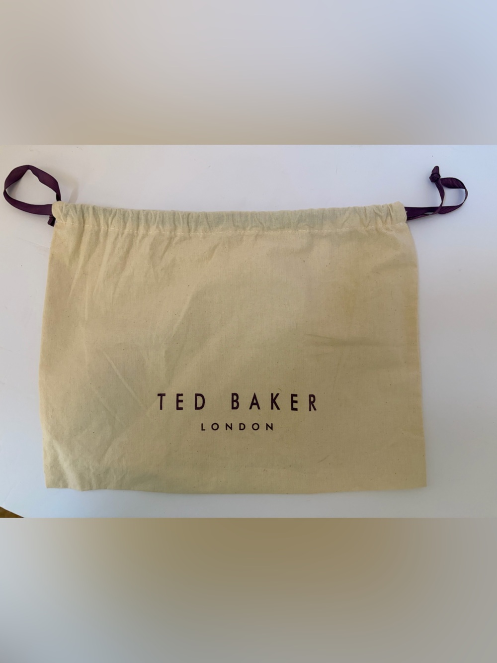 Ted Baker Cream Canvas Dust Bag with Purple Accents